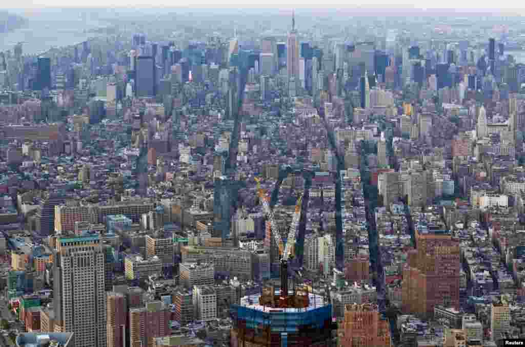 The under-construction One World Trade Center (bottom), August 24, 2011. 