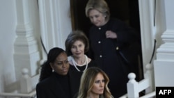 FILE - Former US Secretary of State Hillary Clinton, former US First Lady Laura Bush, former US First Lady Michelle Obama, and former US First Lady Melania Trump arrive for a tribute service for former US First Lady Rosalynn Carter in Atlanta, Georgia, on November 28, 2023.