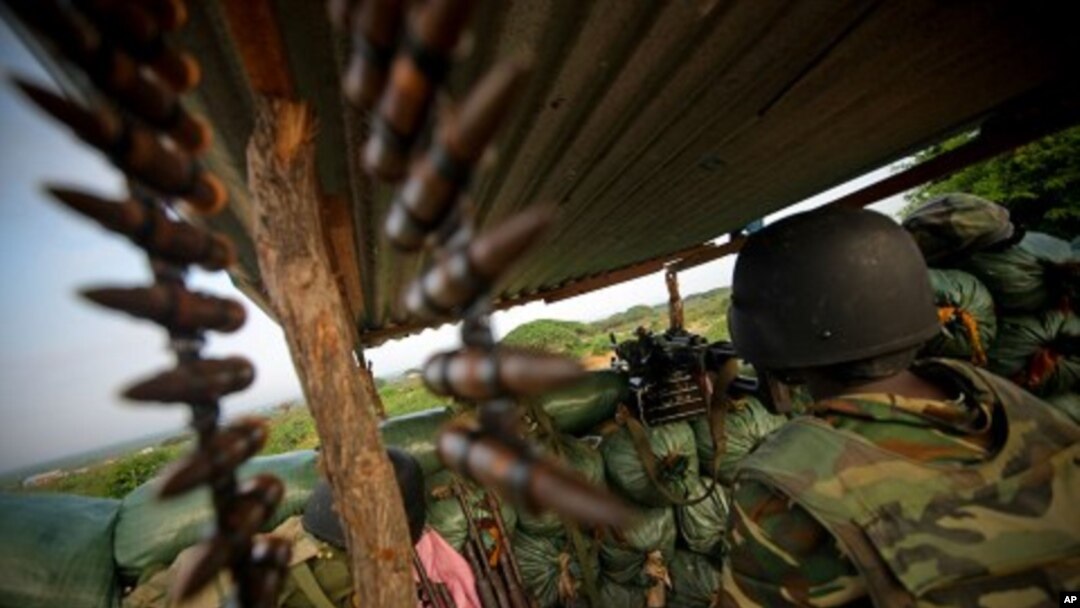 A soldier from Burundi serving with the African Union Mission in Somalia (AMISOM) is seen manning a frontline position in territory recently captured from insurgents in Deynile District along the northern fringes of the capital Mogadishu, November 18, 201