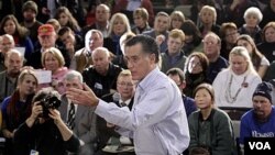 Setelah unggul tipis di Iowa, Mitt Romney melakukan kampanye di kota Manchester, negarabagian New Hampshire (4/1).
