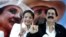 El expresidente de Honduras Manuel Zelaya y su esposa Xiomara, candidata a la presidencia, muestran sus dedos entintados luego de las primarias hondureñas.