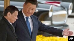 Tổng thống Philippines và Chủ tịch Trung Quốc Tập Cận Bình trong chuyến thăm Trung Quốc hôm 20/10.