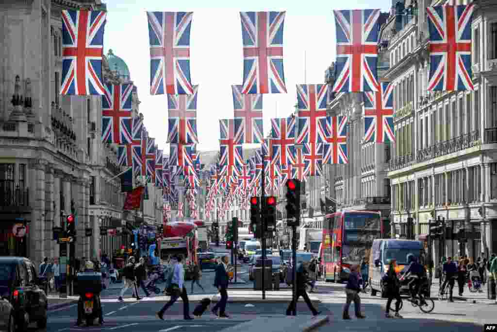 Union flag decorations are seen in Regent Street, London ahead of the Royal Wedding of Prince Harry and US actress Meghan Markle.