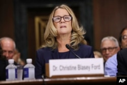 Christine Blasey Ford testifies before the Senate Judiciary Committee, Sept. 27, 2018, in Washington.