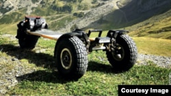 This prototype all-terrain electric skateboard has been modified to permit power-assisted skiing. The ski version was recently demonstrated at the CES show in Las Vegas, Nevada. (Image Credit: SQ-Motors)