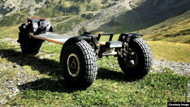 This prototype all-terrain electric skateboard has been modified to permit power-assisted skiing. The ski version was recently demonstrated at the CES show in Las Vegas, Nevada. (Image Credit: SQ-Motors)