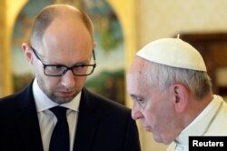 Ukraine's Prime Minister Arseniy Yatsenyuk meets with Pope Francis during a private audience at the Vatican April 26, 2014