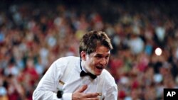 Keith Lockhart conducts the Boston Pops during a July Fourth concert.