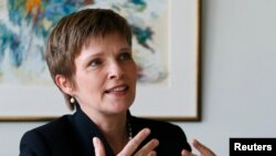 FILE - German central bank (Bundesbank) Vice President Claudia Buch speaks at the Bundesbank headquarters in Frankfurt, May 20, 2014. 