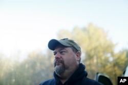 Chris Hopper, 45, Altoona, Alabama, talks about Alabama Senator candidate Roy Moore, Nov. 10, 2017. Hopper, a neighbor of Moore, says, "why not vote for somebody that's got good Christian values ... the allegations with Roy, its mud slinging at its best.