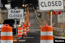 A street is closed due to work in the road in Jersey City, New Jersey, March 31, 2021.