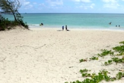 The beach is a very popular summer destination.