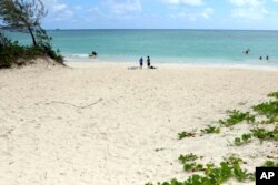The beach is a very popular summer destination.