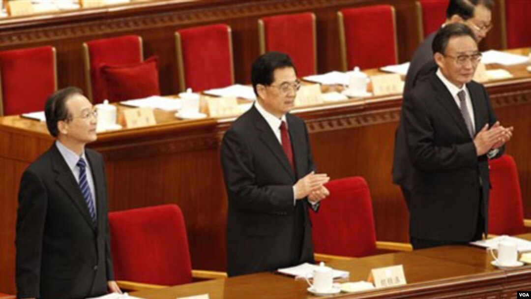Dari kiri ke kanan, Perdana Menteri Tiongkok Wen Jiabao, Presiden Hu Jintao dan politisi Partai Komunis Tiongkok Wu Bangguo di Beijing.