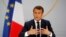 FILE - French President Emmanuel Macron responds to a question during a news conference at the Elysee Palace in Paris.