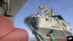 The container vessel "IRAN PIROOZI" anchors at the quay of Aker MTW Shipyard in Wismar, northern Germany, after namegiving ceremony ( 2003 file photo).