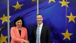 Facebook Chairman and CEO Mark Zuckerberg meets with European Commissioner for Values and Transparency Vera Jourova at the EU Commission headquarters in Brussels, Belgium, Feb. 17, 2020.