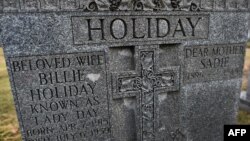 The gravestone of jazz singer and songwriter Billie Holiday at Saint Raymond's Cemetery in New York City, March 25, 2015. 