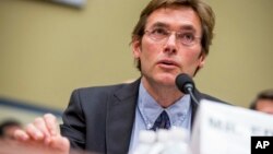 FILE - Virginia Tech professor Marc Edwards testifies in Washington D.C. about the lead in the water in Flint, Michigan, March 15, 2016. Edwards was announced Monday as a winner of a Smithsonian American Ingenuity Award.