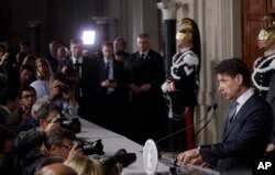 Giuseppe Conte addresses the media after meeting Italian President Sergio Mattarella, at the Quirinale presidential palace in Rome, May 23, 2018.