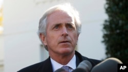 Senator Bob Corker, ranking Republican on the Senate Foreign Relations Committee, speaks to members of the media outside the West Wing of the White House, Nov. 19, 2013, following a meeting with President Barack Obama.