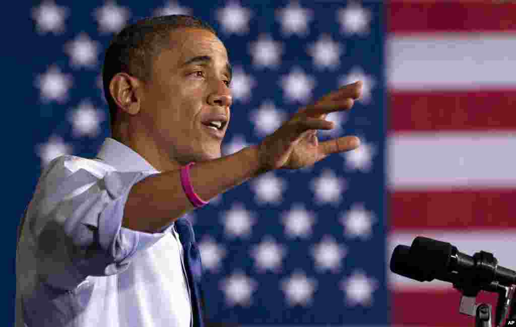 President Barack Obama gestures as speaks at a campaign event at Cornell College, Wednesday, Oct. 17, 2012, in Mt. Vernon, Iowa.
