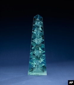 The obelisk-shaped Dom Pedro gem, the world's largest cut aquamarine gem, will go on display at the Smithsonian's National Museum of Natural History in Washington. The crystal was mined in Brazil in the late 1980s and is named for Brazil's first two emper