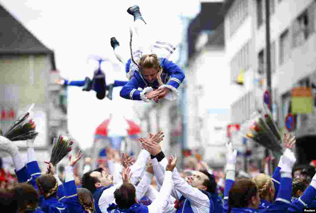 A dance group performs during the &quot;Rosenmontag&quot;, Rose Monday parade in Cologne, Germany.