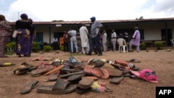 FILE - The belongings of students of Bethel Baptist High School are scattered on school premises as parents of abducted students hope for their return, in the Chikun Local Government Area of Kaduna state, northwest Nigeria, July 14, 2021. 