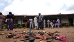 FILE - The belongings of students of Bethel Baptist High School are scattered on school premises as parents of abducted students hope for their return, in the Chikun Local Government Area of Kaduna state, northwest Nigeria, July 14, 2021.