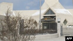 FILE - A partial view of China's embassy in Washington are seen in the U.S. capital, Feb. 19, 2015.