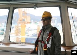 Song Ha-dong, a senior official from Daewoo Shipbuilding and Marine Engineering, speaks during an interview on the building of a large-sized liquefied natural gas (LNG) carrier at the Daewoo facility in Geoje Island, South Korea, Dec. 7, 2018.