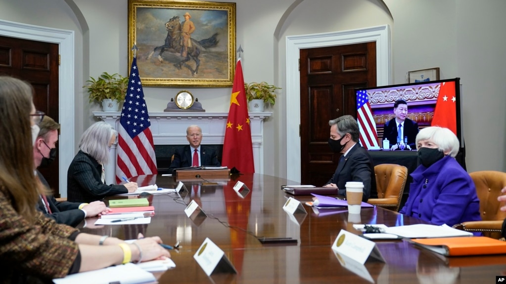 President Joe Biden meets virtually with Chinese President Xi Jinping from the Roosevelt Room of the White House in Washington, Nov. 15, 2021.