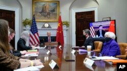 President Joe Biden meets virtually with Chinese President Xi Jinping from the Roosevelt Room of the White House in Washington, Nov. 15, 2021.