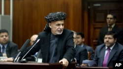 Afghan President Ashraf Ghani speaks during a ceremony at the parliament in Kabul, Afghanistan, Jan. 20, 2015. 