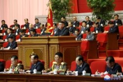 North Korean leader Kim Jong Un speaks on the first day of the 8th Congress of the Workers' Party in Pyongyang, North Korea, in this photo supplied by North Korea's Central News Agency (KCNA) on January 6, 2021.