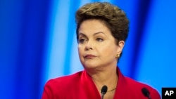 FILE - Brazil's President Dilma Rousseff during a televised presidential debate in Sao Paulo, Sept. 28, 2014. 