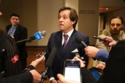 FILE - The French ambassador to the United Nations, Nicolas de Riviere, talks to reporters before a Security Council meeting at U.N. headquarters, Jan. 3, 2020.