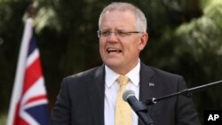 FILE - Australian Prime Minister Scott Morrison delivers a speech in Parramatta, Australia, Nov. 22, 2018.