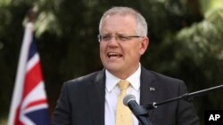 FILE - Australian Prime Minister Scott Morrison delivers a speech in Parramatta, Australia, Nov. 22, 2018.
