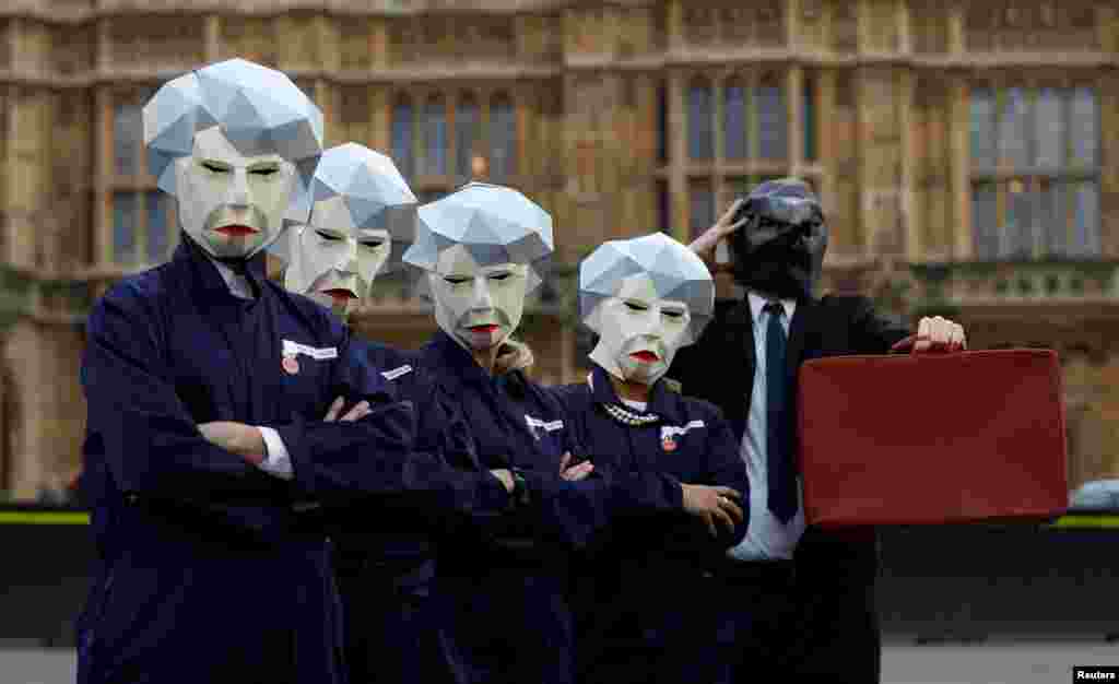 Britain&#39;s GMB union stages a protest outside parliament on the day the Finance Minister Philip Hammond presents his budget in London.