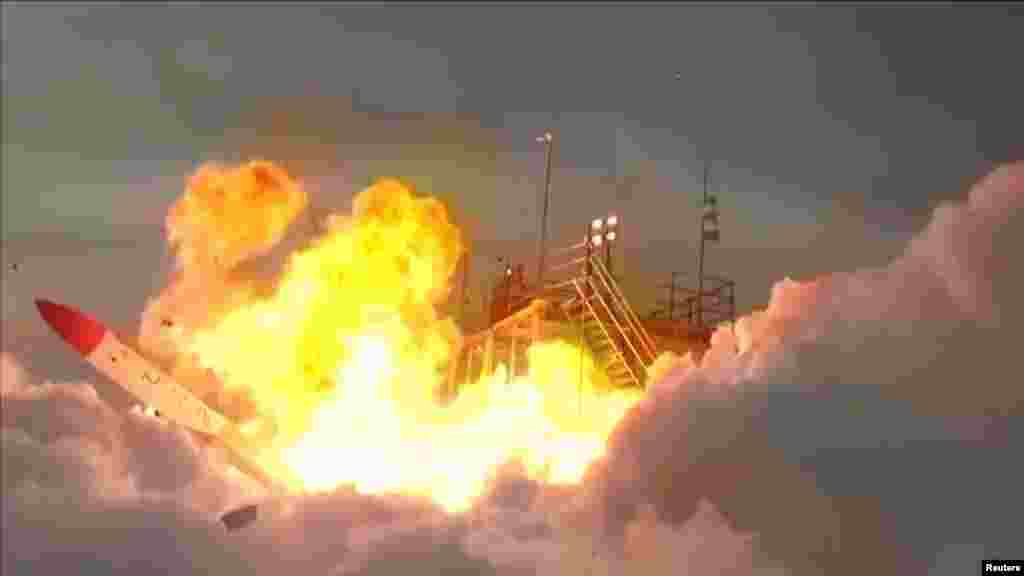 An explosion is seen as the MOMO-2 rocket, made by Japanese company Interstellar Technologies, crashes moments after lifting off in Hokkaido, Japan, June 30, 2018, in this still image taken from a video. (Credit: Interstellar Technologies Inc.)