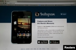 FILE - An Instagram login page is pictured on a laptop screen in Pasadena, Calif., Aug. 14, 2013.