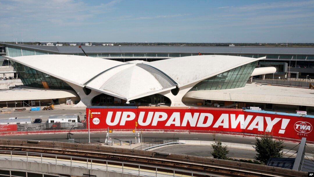 In this Oct. 10, 2017 photo, construction continues on the TWA Hotel at John F. Kennedy International Airport in New York. The hotel at the long-closed TWA Flight Center will conjure the glamour of air travel in 1962 when architect Eero Saarinen’s jet-age landmark first opened. 