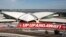 In this Oct. 10, 2017 photo, construction continues on the TWA Hotel at John F. Kennedy International Airport in New York. The hotel at the long-closed TWA Flight Center will conjure the glamour of air travel in 1962 when architect Eero Saarinen’s jet-age landmark first opened. 