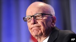 FILE - In this Oct. 14, 2011 file photo, Rupert Murdoch delivers a keynote address at the National Summit on Education Reform in San Francisco. 