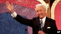 FILE - Game show host Bob Barker, 83, waves goodbye as he tapes his final episode of "The Price Is Right" in Los Angeles on Wednesday, June 6, 2007.