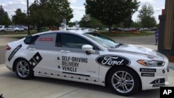 A specially designed delivery car that Ford Motor Co. and Domino’s Pizza use to test self-driving pizza deliveries, at Domino’s headquarters in Ann Arbor, Michigan, Aug. 24, 2017.