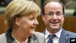 Nemačka kancelarka Angela Merkel i francuski predsednik Fransoa Oland