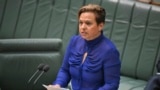 Australia's Minister for Communications, Michelle Rowland, introduces the Online Safety Amendment Bill in the House of Representatives at Parliament House in Canberra, Nov. 21, 2024.